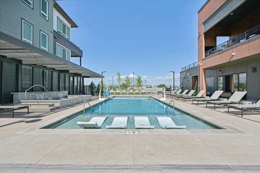 Resort style pool with sunken lounge seating at Sequel Homes Apartments, Englewood, 80110