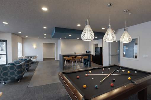 Game room with pool table and kitchenette at Cypress Court Apartments, St Cloud, 56303