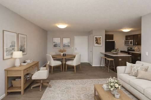 Open concept living room and dining area at Prosper West Apartments, Minnesota, 56387