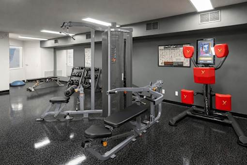 Fitness center with weight machines at Regency Park Apartments, Minnesota