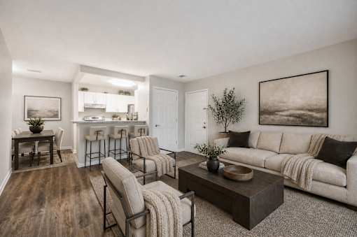 Open concept living room with bar seating at Northview Park Apartments, Sterling Heights, MI