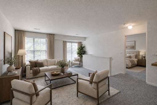 A living room with a couch, chairs, and a coffee table.
