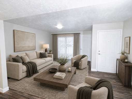 Spacious living room with neutral furnishings at Creekview Apartments, Midvale, Utah