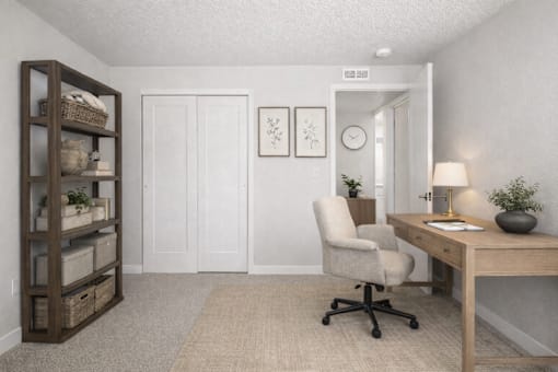 Home office with desk and shelving unit at Fort Lane Apartments, Layton, UT 84041