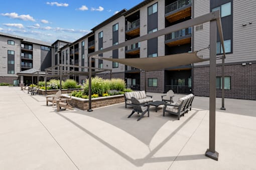 Patio area with tables at Cedar Green, Blaine, MN, 55434