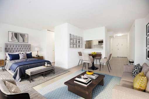 Large alcove studio with a separate kitchen