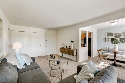 Living Room With kitchen View at Doncaster Village Apartments, Parkville, MD