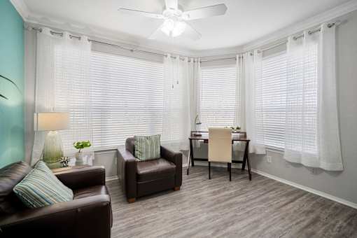 sitting room with chairs at The Grand Reserve at Tampa Palms Apartments, Florida, 33647