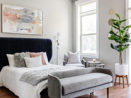 Bed with foot seating at St. Marys Square Apartments, North Carolina
