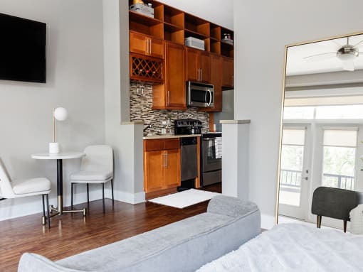 Studio apartment with bedroom and kitchen at St. Marys Square Apartments, Raleigh, NC, 27605