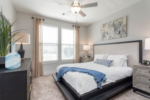 a bedroom with a large bed and a ceiling fan at Bristol at New Riverside, Bluffton, SC 29910