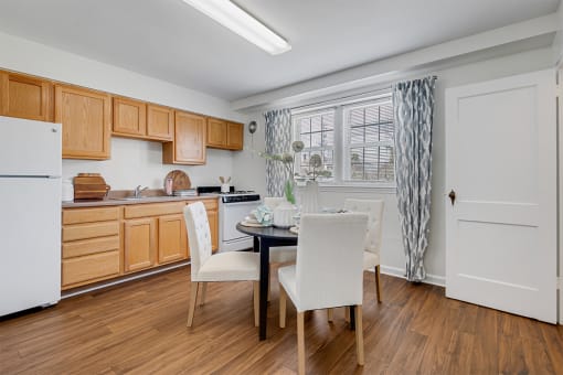Kitchen with hardwood flooring and window  at Cross Country Manor Apartments, Baltimore