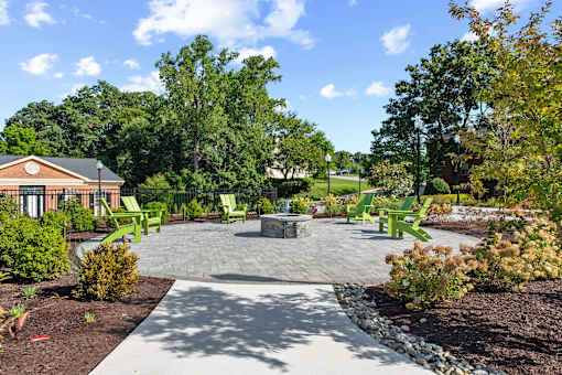 a patio with chairs and a fire pit at Courthouse Square Apartments, Towson, MD, 21286