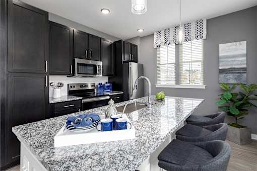 Kitchen with granite countertop at Elevate at Brighton Park, South Carolina, 29486
