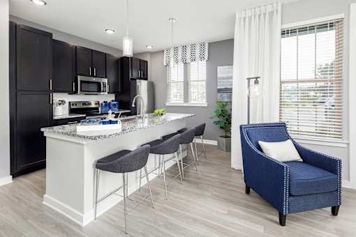 Kitchen with bar area at Elevate at Brighton Park, Summerville, 29486