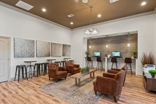 community room with seating and a wall with computers at Fortress Grove, Murfreesboro, TN