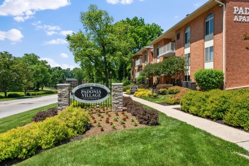 Community sign and flower bed at Padonia Village Apartments, Timonium, 21093