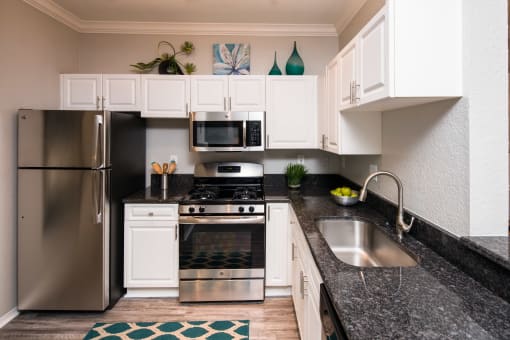 Gourmet Kitchen at The Grand Reserve at Tampa Palms Apartments, Tampa, FL, 33647