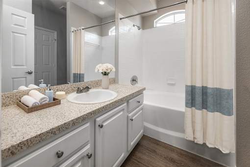 A bathroom with a sink at Henley Tampa Palms Apartments, Tampa