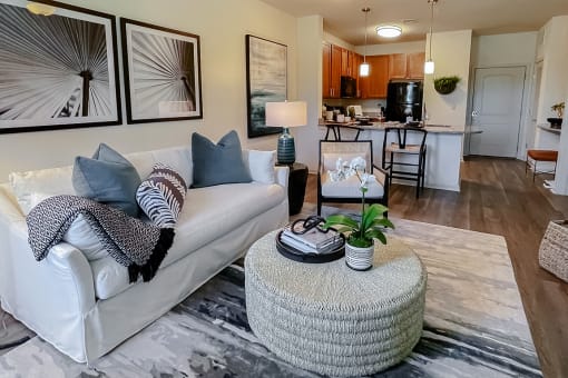 Open living room kitchen and dining area at Two Addison Place Apartments , Pooler