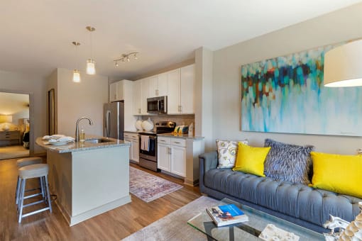 room with couch and kitchen island at 1010 Dilworth Apartments, Charlotte