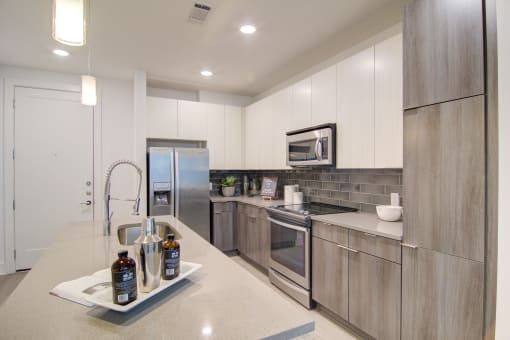 Kitchen with Island at Millworks Apartments, Atlanta