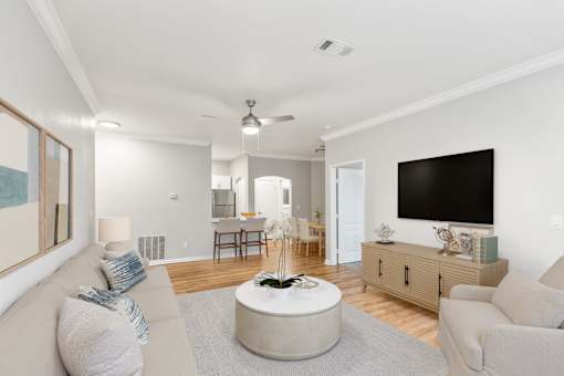 A living room with a grey couch and a round coffee table at Sweetgrass Landing, Mount Pleasant, South Carolina, 29466