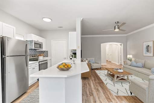 A modern kitchen with a refrigerator, stove, and oven at Sweetgrass Landing, Mount Pleasant, 29466