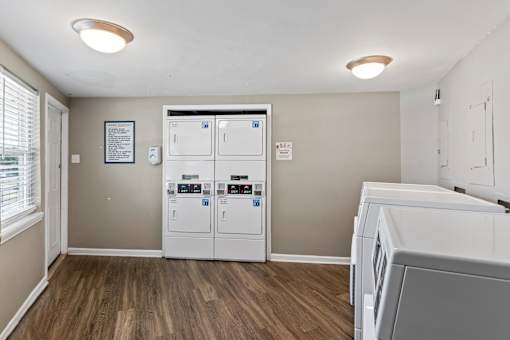 A laundry room with a washer and dryer.