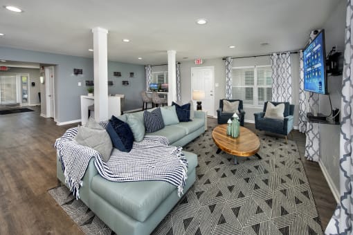 a living room with couches and a coffee table