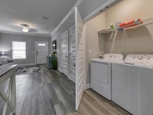 A laundry room with a washer and dryer.