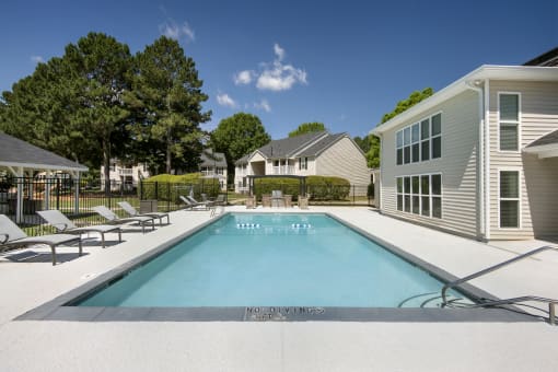 the swimming pool at villas on the avenue apartments