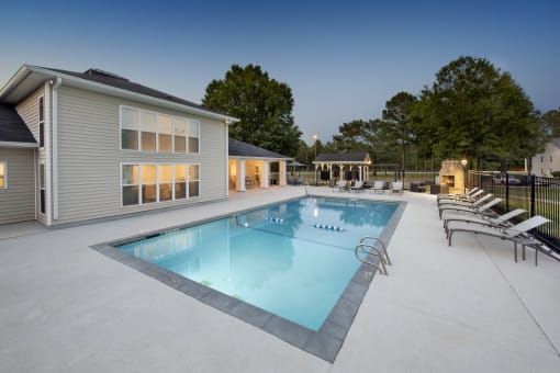 the swimming pool at our apartments at dusk