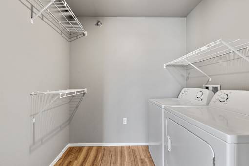 walk in closet with laundry
