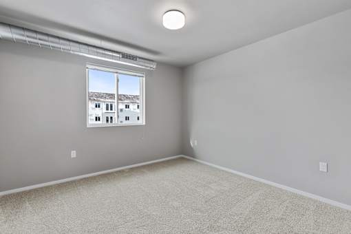 bedroom with large windows