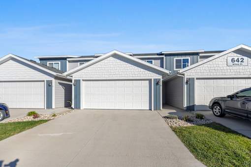 A row of houses with the number 642 on the front of the first one.