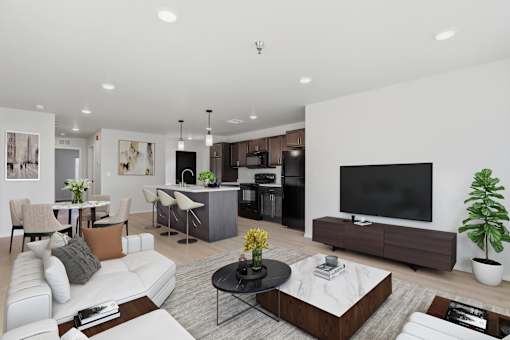 A modern living room with a white sofa, a black coffee table, and a flat-screen TV.
