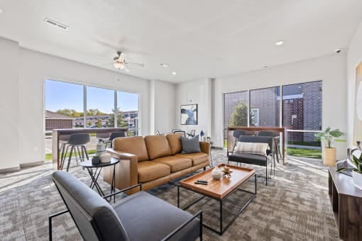 Spacious living room with neutral walls and ample natural light.