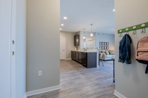 Well-equipped kitchen featuring espresso cabinetry and ample counter space