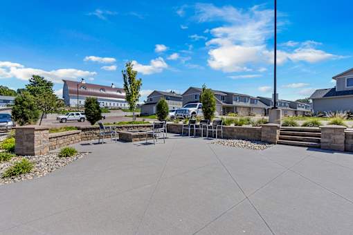 A sunny day at a residential complex with a clear blue sky.