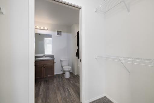 A bathroom with a toilet and sink is shown.