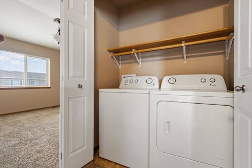 A laundry room with a washer and dryer.