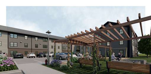 A modern building with a wooden pergola and people sitting on benches.