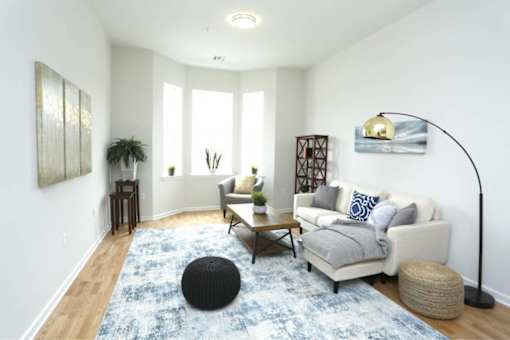 a living room with a couch and a table