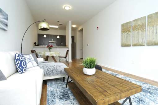a living room with a couch and a table