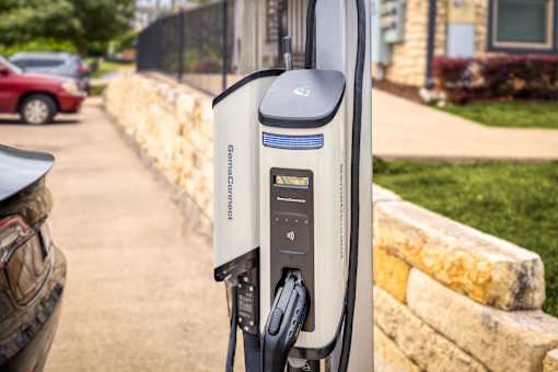 a parking meter on the side of a street at Radius on Grove, Austin