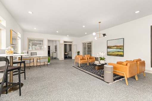 a living room with couches and chairs and a dining room table at Radius on Grove, Texas, 78741