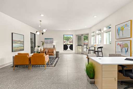 four columns of meeting rooms with a row of counters and a table with chairs at Radius on Grove, Austin, 78741
