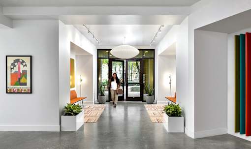 Modern entryway with polished concrete floors at THE'68 Apartments, San Antonio, TX 78205