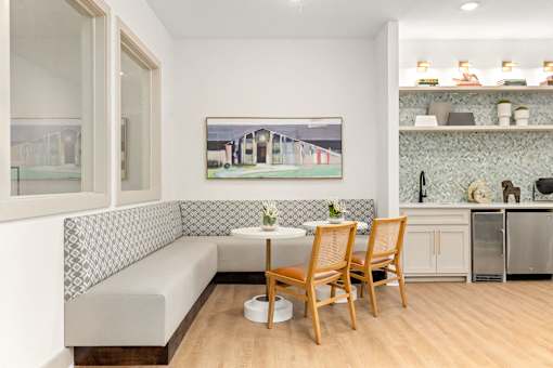 a living room with a couch and chairs and a table at Radius on Grove, Austin, Texas